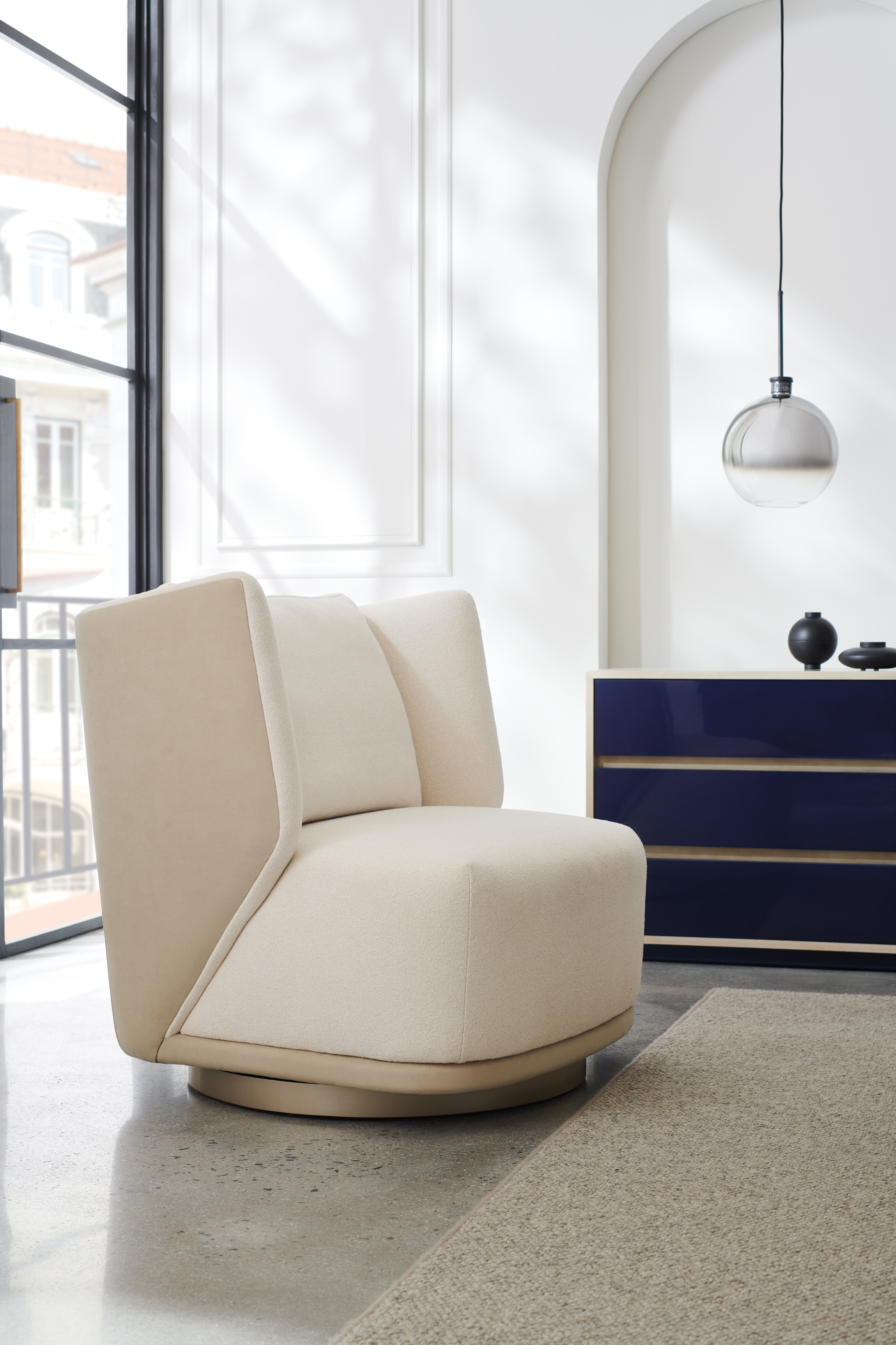 caracole swivel chair