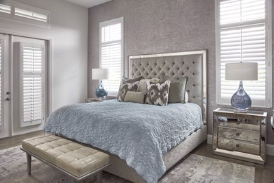 Image of blue & silver bedroom in Isles of Collier Preserve Residence. Interior Design by Mary Wiggins.