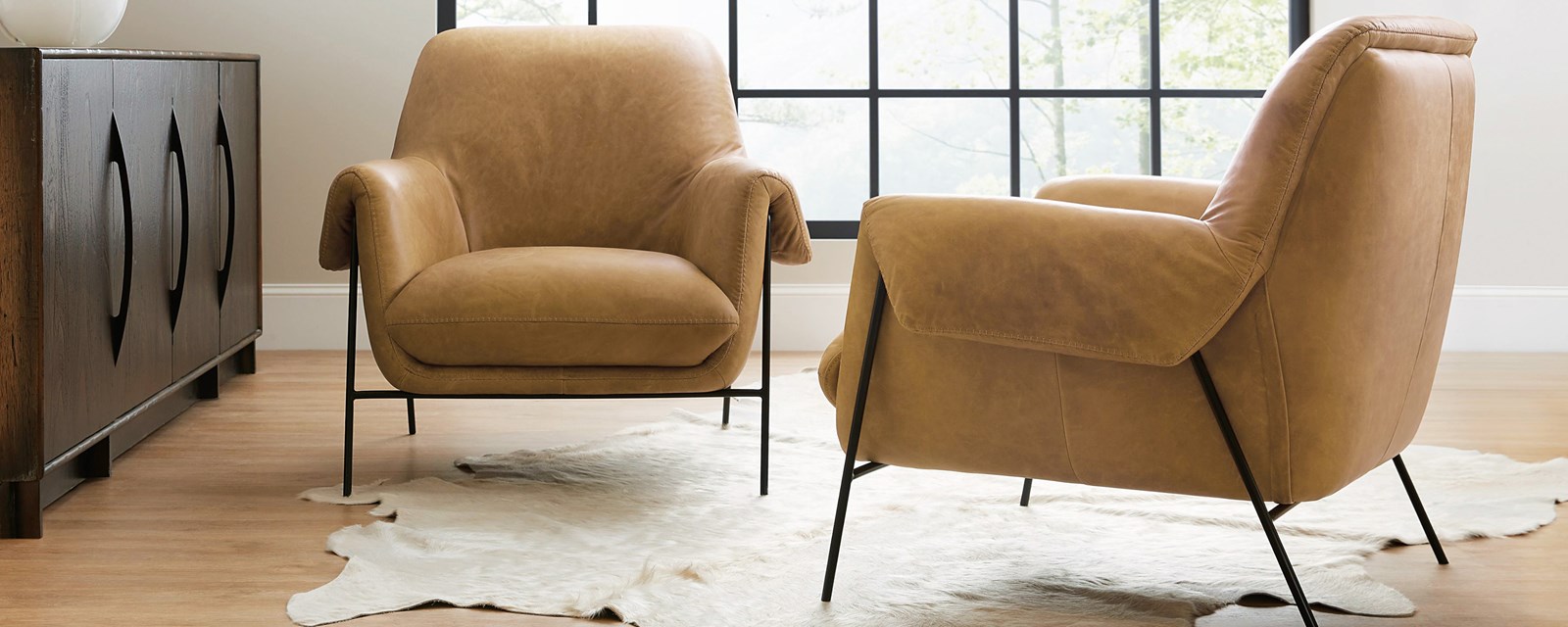 Image of the Ambroise leather accent chairs.