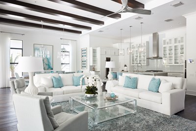 Blue & White living room with lucite cocktail table.