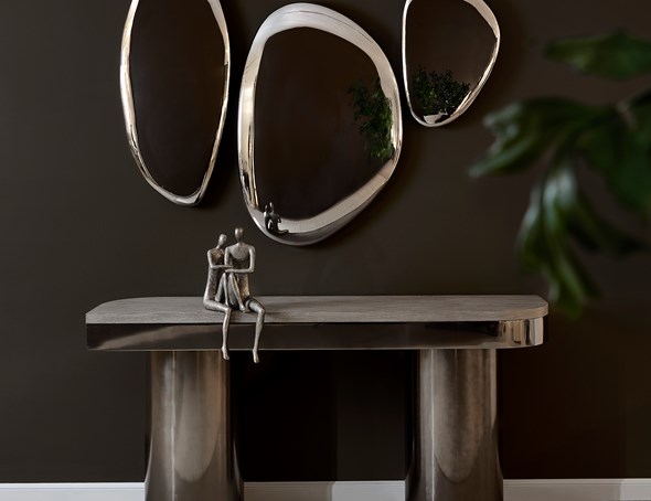 Modern Fusion vignette of consle with silver organic wall art.