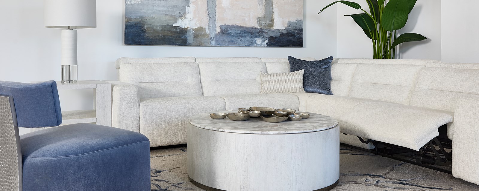 Image of the Carino Sectional with open reclining seat.