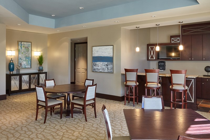 Paramount at Gulf Harbour tables and gathering space photographed by its design-project source
