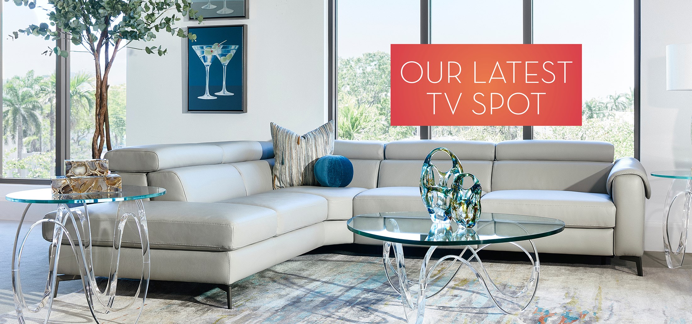 Image of the Puro Sectional. Text: Our Latest TV Spot. Links to the Sizzling Summer TV Spot on Youtube.