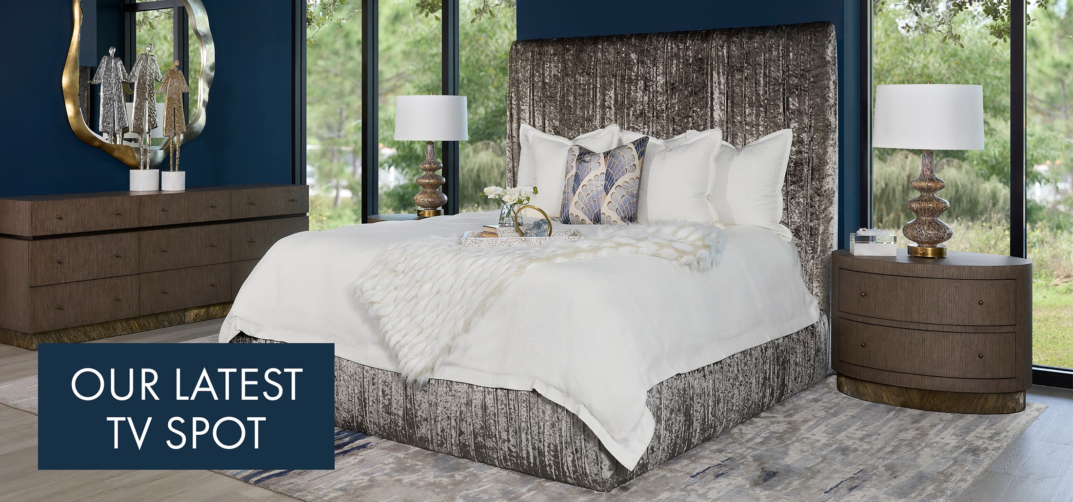 Image of the Fosser King Bed with matching nightstands and dresser. Text: Our Latest TV Spot. Links to TV Spot on Youtube.