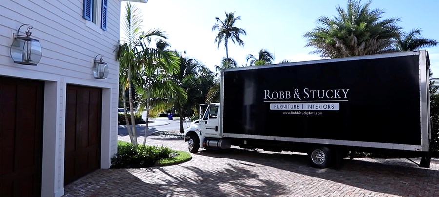 Photo of Robb and Stucky delivery truck with text explaining that we can deliver world wide, with a link to email Robb & Stucky for more information.