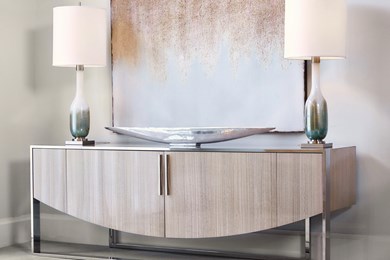 a photo of a contemporary sideboard in a showroom vignette